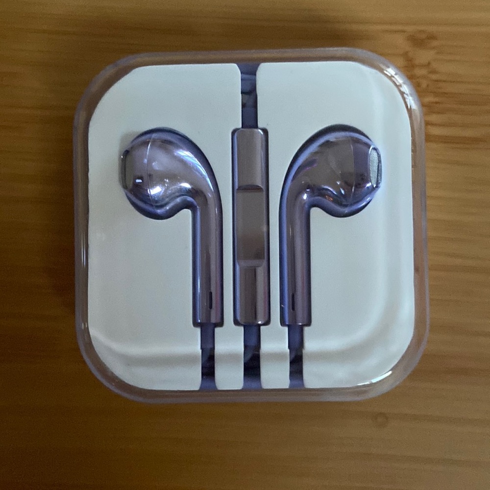 NWOT Metallic purple wired headphones with 3.5mm jack, still in original box
